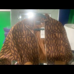 Adidas Ivy Park crop monogram track jacket